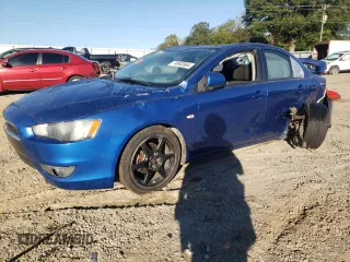 2009 Mitsubishi Lancer ES with VIN JA3AU26UX9U022011, listed as a Copart auction lot 74943964 with 129,312 mi miles and Salvage Title. Bid and sale history available at DreamBid. Image 1.