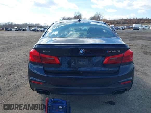 2018 BMW 5 Series M550i xDrive with VIN WBAJB9C52JB035930, listed as a IAAI auction lot 41674415 with 56,294 mi miles and . Bid and sale history available at DreamBid. Image 16.