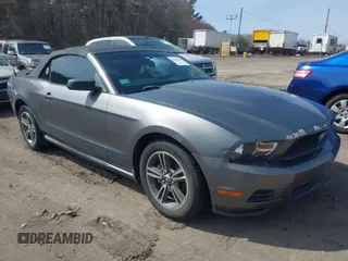 2010 Ford Mustang V6 with VIN 1ZVBP8EN6A5107210, listed as a IAAI auction lot 41954786 with 142,198 mi miles. Bid and sale history available at carsss.com. Image 1.