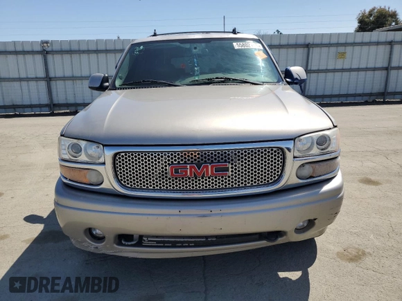 2006 GMC Yukon XL with VIN 1GKFK66U36J134459, listed as a Copart auction lot 55802165 with 277,366 mi miles and Salvage title. Bid and sale history available at DreamBid. Image 5.
