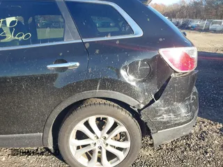 2011 Mazda CX-9 Grand Touring with VIN JM3TB3DV5B0322044, listed as a IAAI auction lot 40886500 with Not provided miles and . Bid and sale history available at DreamBid. Image 6.