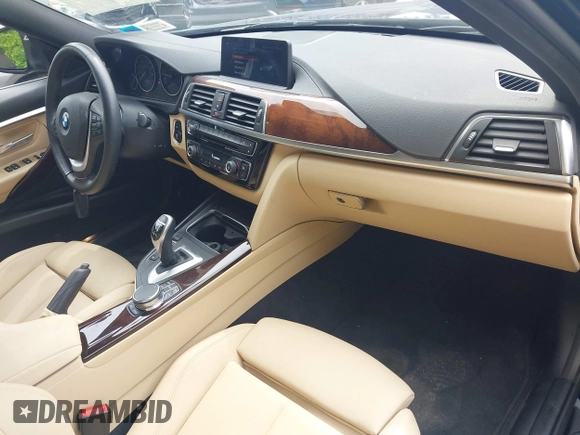 2018 BMW 3 Series 330i xDrive with VIN WBA8D9C52JA608243, listed as a IAAI auction lot 42630988 with 48,015 mi miles and . Bid and sale history available at DreamBid. Image 5.