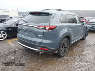2022 Mazda CX-9 Grand Touring with VIN JM3TCBDYXN0628615, listed as a IAAI auction lot 41431786 with 28,738 mi miles. Bid and sale history available at carsss.com. Image 4.