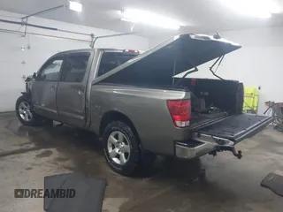 2006 Nissan Titan LE z VIN 1N6BA07B26N572273, wystawiony jako IAAI lot #41252390 z przebiegiem 88 457 mil mil oraz . Historia ofert i sprzedaży dostępna na DreamBid. Obrazek 3.