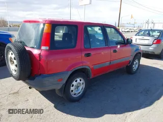 1999 Honda CR-V LX with VIN JHLRD2847XC009921, listed as a IAAI auction lot 41795325 with 268,638 mi miles. Bid and sale history available at carsss.com. Image 4.