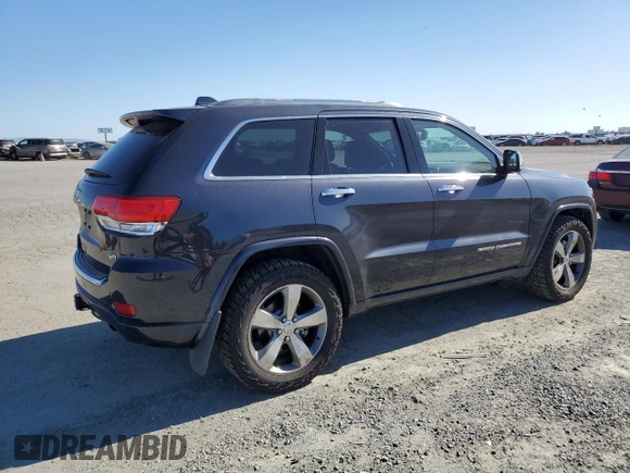 2015 Jeep Grand Cherokee Overland with VIN 1C4RJFCM3FC887817, listed as a Copart auction lot 57420185 with 145,971 mi miles and Clean title. Bid and sale history available at DreamBid. Image 3.