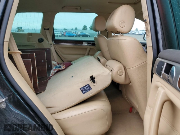 2008 Volkswagen Touareg V6 z VIN WVGLE77L28D026719, wystawiony jako Copart lot #48539225 z przebiegiem Nie podano mil oraz Szkoda całkowita • Salvage title. Historia ofert i sprzedaży dostępna na DreamBid. Obrazek 11.