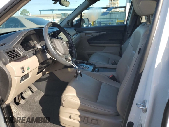 2021 Honda Pilot EX-L with VIN 5FNYF5H54MB045464, listed as a Copart auction lot 63412425 with 60,666 mi miles and Salvage title. Bid and sale history available at DreamBid. Image 7.