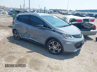2021 Chevrolet Bolt EV Premier z VIN 1G1FZ6S01M4106836, wystawiony jako IAAI lot #42438764 z przebiegiem 27 894 mil mil oraz . Historia ofert i sprzedaży dostępna na DreamBid. Obrazek 1.