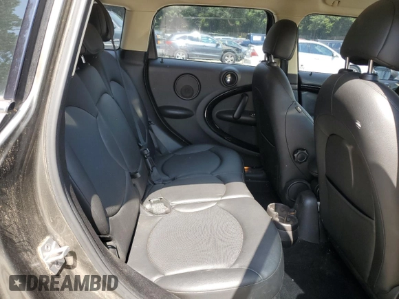 2014 MINI Countryman S with VIN WMWZC3C57EWP25099, listed as a Copart auction lot 62646555 with 153,059 mi miles and Salvage title. Bid and sale history available at DreamBid. Image 10.