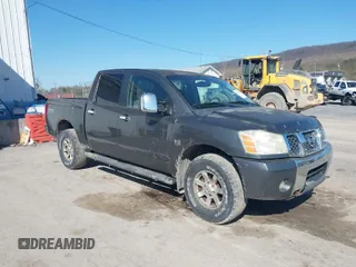 2004 Nissan Titan LE with VIN 1N6AA07B24N574789, listed as a IAAI auction lot 42039183 with 147,691 mi miles. Bid and sale history available at carsss.com. Image 1.
