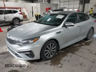 2019 Kia Optima LX with VIN 5XXGT4L39KG354118, listed as a IAAI auction lot 41621171 with 96,441 mi miles. Bid and sale history available at carsss.com. Image 2.