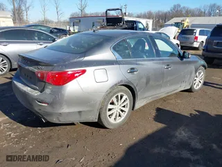 2015 Infiniti Q50 Premium with VIN JN1BV7AP4FM334762, listed as a IAAI auction lot 41443049 with 99,519 mi miles. Bid and sale history available at carsss.com. Image 4.