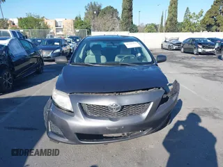 2009 Toyota Corolla with VIN 1NXBU40E09Z147694, listed as a IAAI auction lot 41741275 with 170,912 mi miles. Bid and sale history available at carsss.com. Image 13.