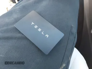 2023 Tesla Model Y Long Range with VIN 7SAYGDEE5PA094253, listed as a IAAI auction lot 41701966 with 29,458 mi miles and . Bid and sale history available at DreamBid. Image 11.
