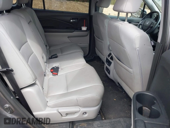 2017 Honda Pilot Touring with VIN 5FNYF6H92HB012090, listed as a IAAI auction lot 41882542 with 110,179 mi miles and . Bid and sale history available at DreamBid. Image 8.
