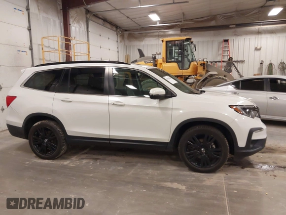 2021 Honda Pilot Special Edition with VIN 5FNYF6H2XMB054312, listed as a IAAI auction lot 41828508 with 115,652 mi miles and . Bid and sale history available at DreamBid. Image 13.