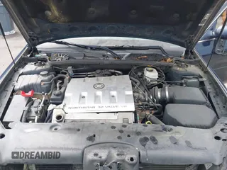 2003 Cadillac DeVille with VIN 1G6KD54Y53U232586, listed as a IAAI auction lot 42071165 with 174,403 mi miles. Bid and sale history available at carsss.com. Image 10.