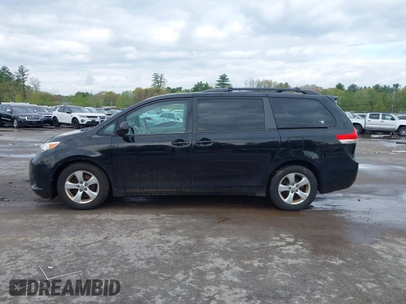 2014 Toyota Sienna LE AAS with VIN 5TDKK3DC0ES487830, listed as a IAAI auction lot 42216342 with 155,973 mi miles and . Bid and sale history available at carsss.com. Image 14.