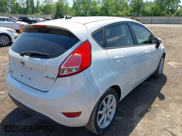 2016 Ford Fiesta SE z VIN 3FADP4EJ7GM137469, wystawiony jako IAAI lot #42278469 z przebiegiem 98 731 mil mil oraz . Historia ofert i sprzedaży dostępna na DreamBid. Obrazek 4.
