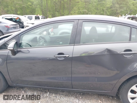 2013 Kia Rio EX with VIN KNADN4A34D6285952, listed as a IAAI auction lot 42036441 with 153,462 mi miles and . Bid and sale history available at DreamBid. Image 14.