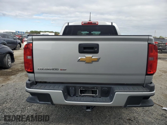 2019 Chevrolet Colorado 2WD Work Truck with VIN 1GCGSBEN1K1350825, listed as a Copart auction lot 87717925 with 67,314 mi miles and Salvage title. Bid and sale history available at DreamBid. Image 6.