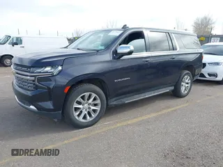 2022 Chevrolet Suburban Premier with VIN 1GNSKFKD5NR293216, listed as a IAAI auction lot 41778432 with 76,471 mi miles. Bid and sale history available at carsss.com. Image 2.