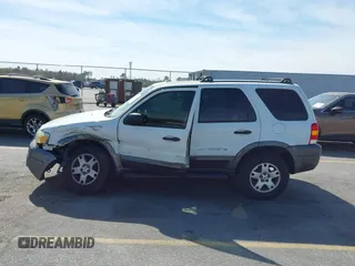 2005 Ford Escape XLT with VIN 1FMYU03165KA93495, listed as a IAAI auction lot 41821975 with 202,475 mi miles and . Bid and sale history available at DreamBid. Image 14.