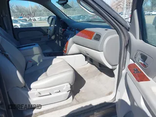 2011 Chevrolet Suburban LT with VIN 1GNSKJE34BR335361, listed as a IAAI auction lot 41736341 with 170,422 mi miles. Bid and sale history available at carsss.com. Image 5.