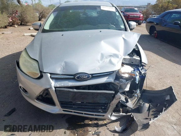 2013 Ford Focus SE with VIN 1FADP3F21DL184625, listed as a IAAI auction lot 42575194 with 113,601 mi miles and . Bid and sale history available at DreamBid. Image 13.
