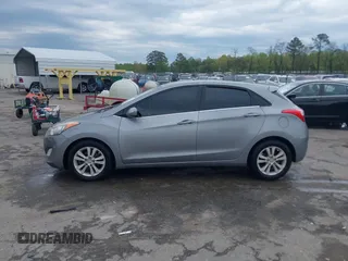 2013 Hyundai Elantra GT with VIN KMHD35LE1DU058318, listed as a IAAI auction lot 42036716 with 146,845 mi miles. Bid and sale history available at carsss.com. Image 14.