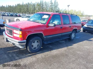 1996 GMC Suburban with VIN 1GKFK16R4TJ742646, listed as a IAAI auction lot 42004439 with 196,923 mi miles. Bid and sale history available at carsss.com. Image 2.