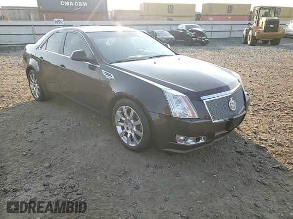 2009 Cadillac CTS AWD z VIN 1G6DT57V990136974, wystawiony jako Copart lot #50154525 z przebiegiem 196 934 mil mil oraz Szkoda całkowita • Salvage title. Historia ofert i sprzedaży dostępna na DreamBid. Obrazek 11.