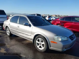 2001 Nissan Maxima SE with VIN JN1CA31D11T814173, listed as a IAAI auction lot 41090095 with 195,749 mi miles and . Bid and sale history available at DreamBid. Image 1.