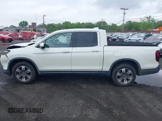 2019 Honda Ridgeline RTL-E with VIN 5FPYK3F75KB020713, listed as a IAAI auction lot 42191152 with 31,245 mi miles and . Bid and sale history available at DreamBid. Image 14.