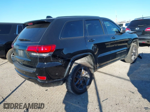 2021 Jeep Grand Cherokee 80th Anniversary with VIN 1C4RJFBG9MC527654, listed as a IAAI auction lot 41212055 with 92,436 mi miles and . Bid and sale history available at DreamBid. Image 4.