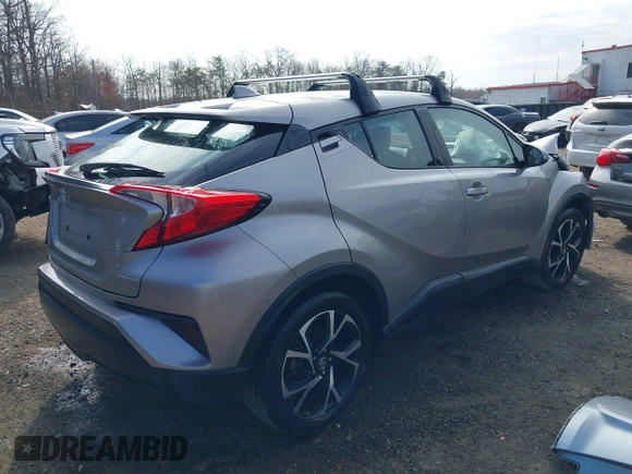 2018 Toyota C-HR XLE with VIN NMTKHMBX6JR057321, listed as a IAAI auction lot 41894322 with 50,606 mi miles. Bid and sale history available at carsss.com. Image 4.