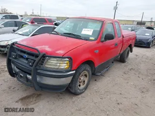1997 Ford F-150 Standard with VIN 1FTDX1724VKC03446, listed as a IAAI auction lot 41333631 with 177,688 mi miles. Bid and sale history available at carsss.com. Image 2.
