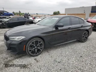 2021 BMW 5 Series 530e with VIN WBA13AG00MCF09677, listed as a Copart auction lot 54907205 with 50,033 mi miles and Salvage title. Bid and sale history available at DreamBid. Image 1.