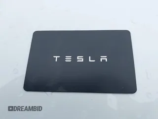2023 Tesla Model Y Long Range with VIN 7SAYGDEE7PF809164, listed as a IAAI auction lot 41828974 with 31,772 mi miles. Bid and sale history available at carsss.com. Image 11.