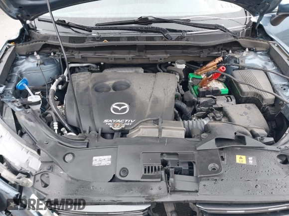 2016 Mazda CX-5 Sport with VIN JM3KE4BY5G0727608, listed as a IAAI auction lot 41975279 with 95,817 mi miles and . Bid and sale history available at carsss.com. Image 10.