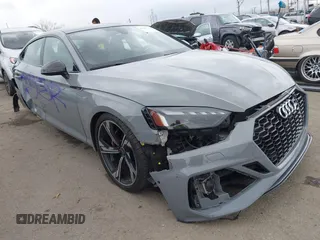 2022 Audi RS 5 Sportback z VIN WUAAWCF50NA902644, wystawiony jako IAAI lot #41513761 z przebiegiem 30 600 mil mil oraz . Historia ofert i sprzedaży dostępna na DreamBid. Obrazek 1.