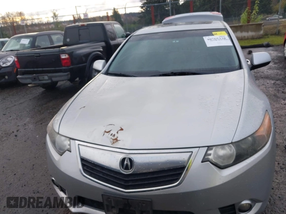 2012 Acura TSX Tech Pkg with VIN JH4CU2F62CC012290, listed as a IAAI auction lot 40765338 with 129,737 mi miles. Bid and sale history available at carsss.com. Image 12.