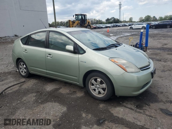 2007 Toyota Prius z VIN JTDKB20U677574248, wystawiony jako Copart lot #53359355 z przebiegiem 225 445 mil mil oraz Czysty tytuł • Clean title. Historia ofert i sprzedaży dostępna na DreamBid. Obrazek 4.