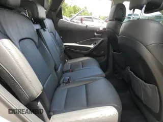 2017 Hyundai Santa Fe Ultimate z VIN 5XYZW4LA8HG491652, wystawiony jako Copart lot #56907985 z przebiegiem Nie podano mil oraz Szkoda całkowita • Salvage title. Historia ofert i sprzedaży dostępna na DreamBid. Obrazek 11.