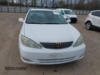 2003 Toyota Camry LE with VIN 4T1BE30K73U227420, listed as a IAAI auction lot 41838940 with 213,470 mi miles and . Bid and sale history available at DreamBid. Image 6.