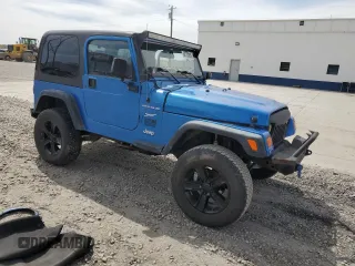 2002 Jeep Wrangler Sport with VIN 1J4FA49S32P762794, listed as a Copart auction lot 52132955 with 243,499 mi miles and Salvage Title. Bid and sale history available at carsss.com. Image 4.