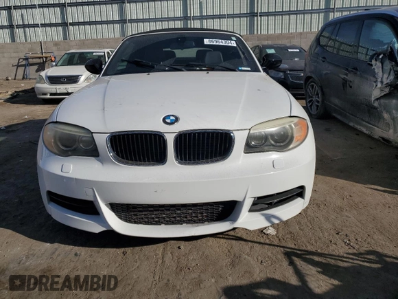 2013 BMW 1 Series 135i with VIN WBAUN7C57DVM27118, listed as a Copart auction lot 86964304 with 57,182 mi miles and Salvage Title. Bid and sale history available at carsss.com. Image 5.