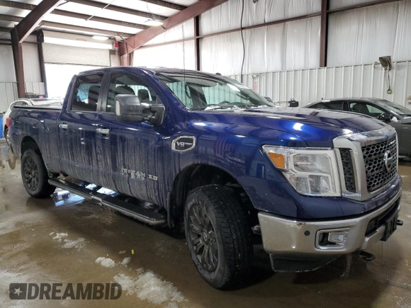 2017 Nissan Titan XD SL with VIN 1N6AA1F40HN515951, listed as a Copart auction lot 87587115 with 79,970 mi miles and Salvage Title. Bid and sale history available at carsss.com. Image 4.