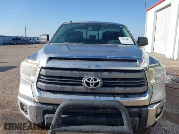 2014 Toyota Tundra SR with VIN 5TFRM5F13EX078411, listed as a IAAI auction lot 42702477 with 123,336 mi miles and . Bid and sale history available at DreamBid. Image 6.
